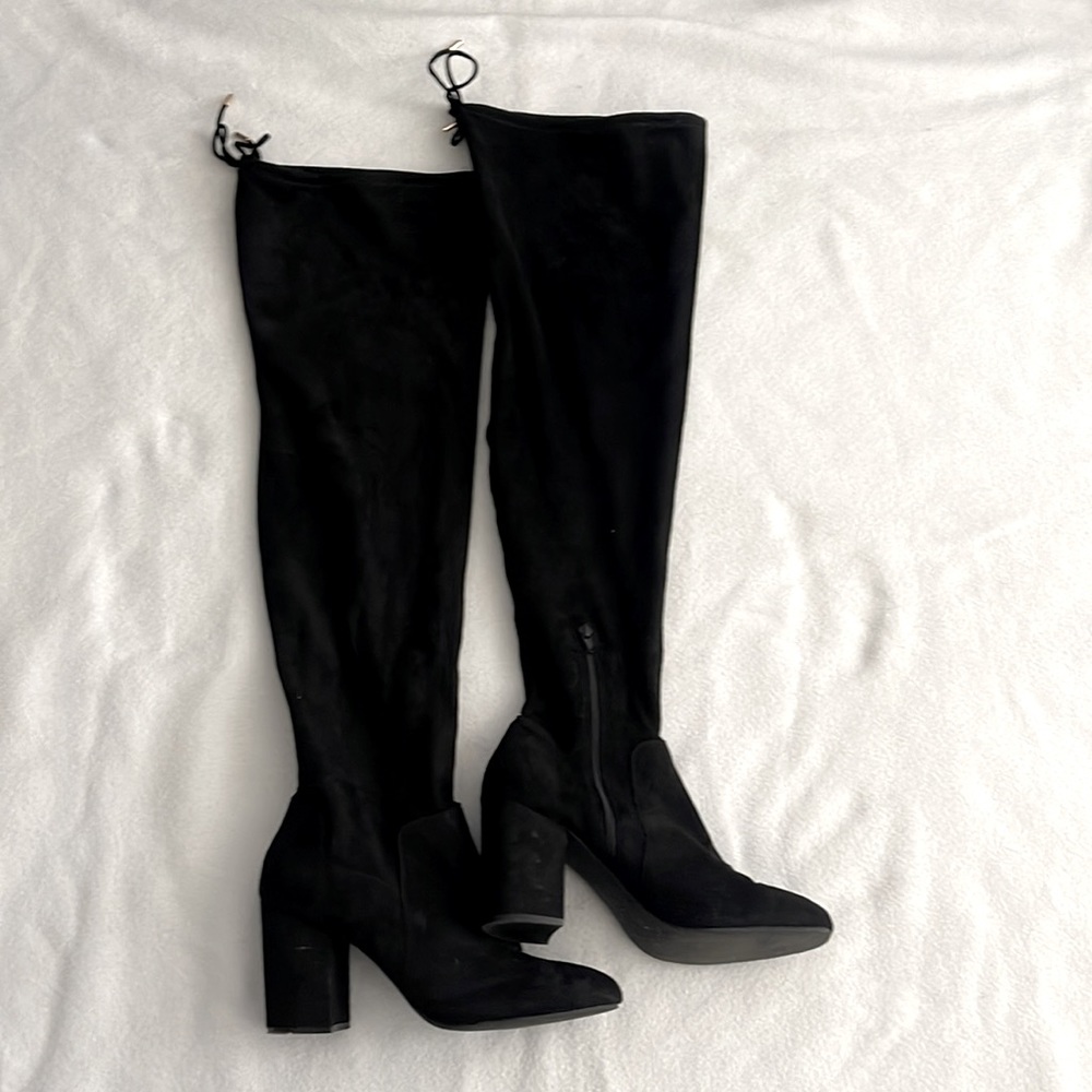 Woman’s thigh high boots
